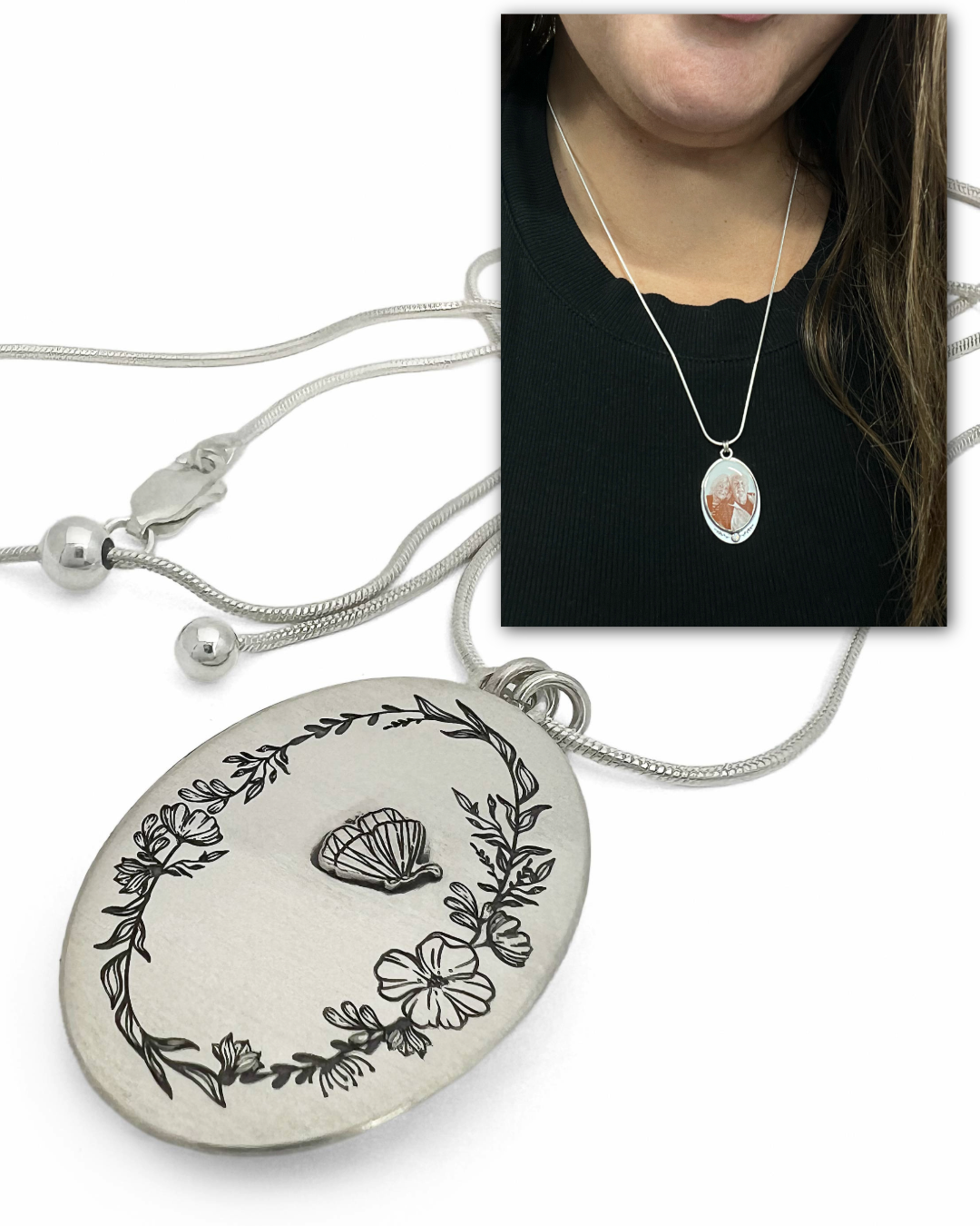 Silver necklace with a rings of flowers and a raised butterfly detail.