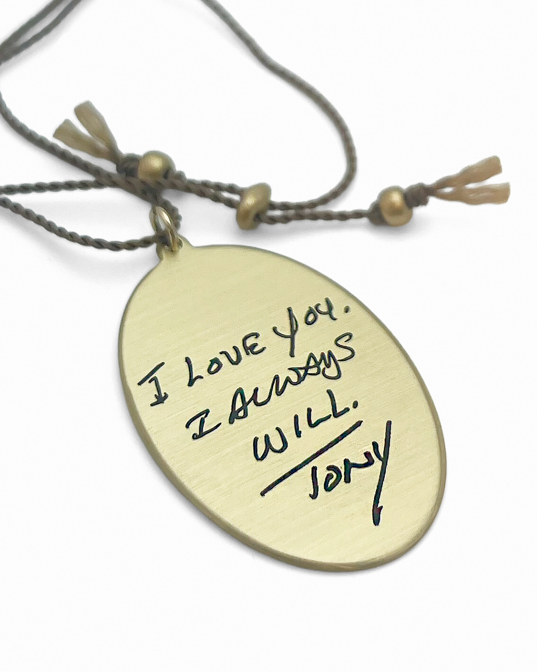 Large oval, gold pendant with engraved handwriting from Scripted Jewelry