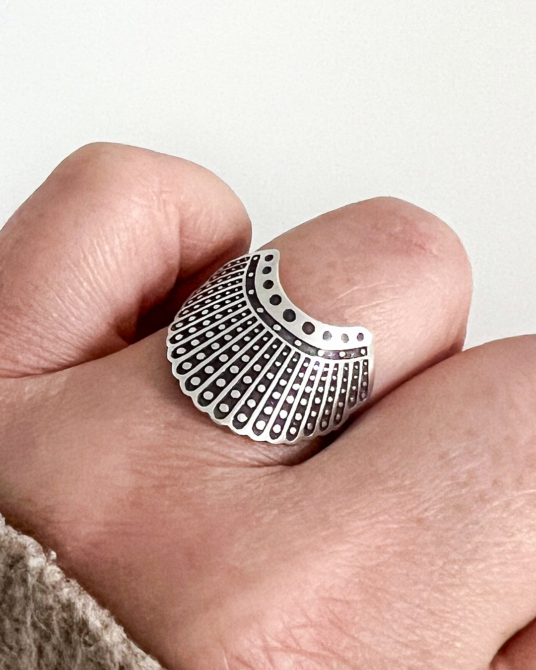 Silver ring with protest symbolism