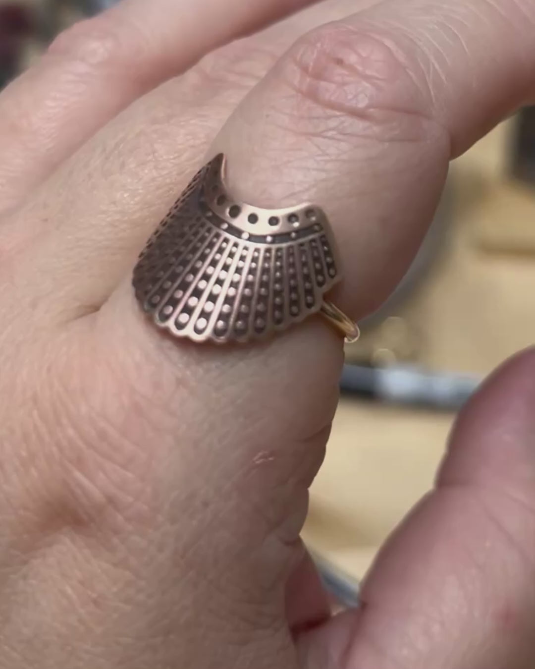 Feminist protest ring in bronze